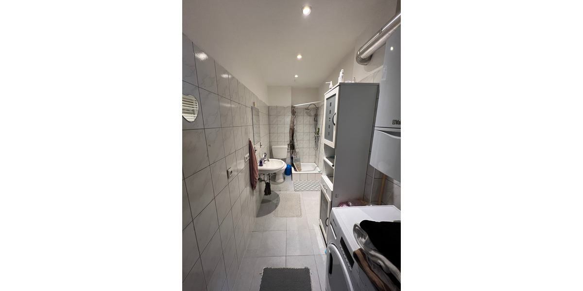 Investorenobjekt mit 3 Wohnungen, 2 Ladenlokalen und Erweiterungsmöglichkeiten zimmer