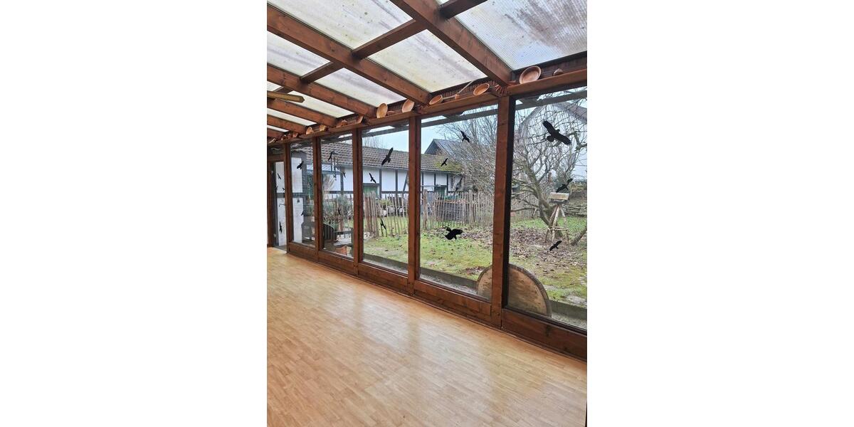 Helle Parterre Wohnung mit Garten und Wintergarten 2 zimmer