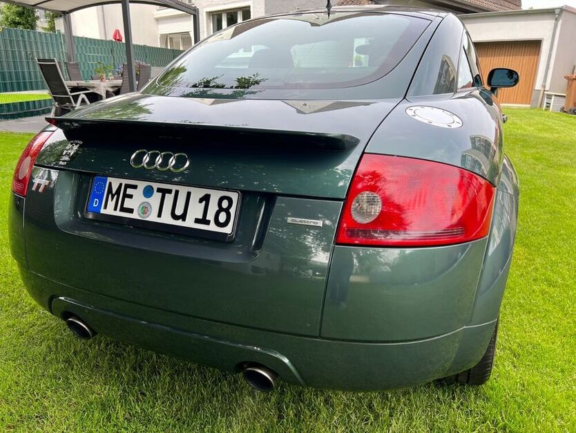 TT