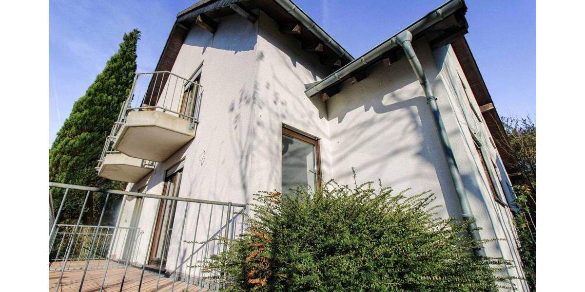 Aufgeteiltes Wohn- und Bürohaus in Sackgassenlage mit Tiefgarage und großem Naturgarten 1 zimmer