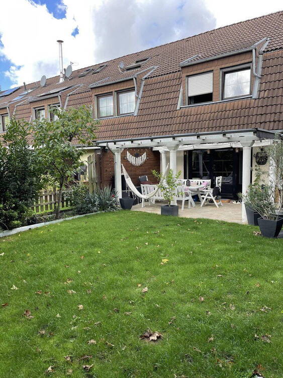 Attraktives Reihenendhaus mit EinliegerWohnung, Garten & Carport - Viel Platz für Familie & mehr
